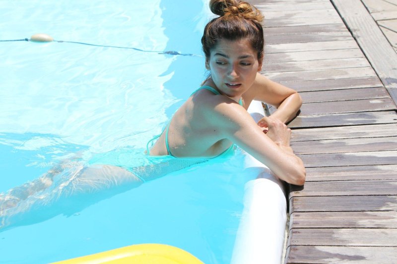 Girl in the pool, Turquoise swimsuit, Girl in a swimsuit the pool
