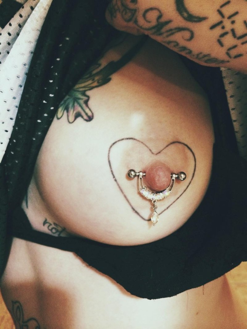 Porn piercing on nipples, Tattoo heart on the chest, Heart tattoo on the chest